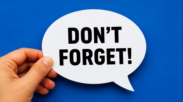 A hand holds a white speech bubble with the text "DON'T FORGET!" against a blue background.