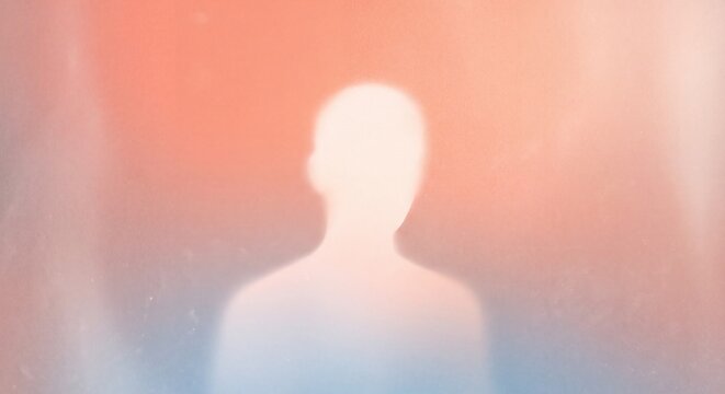 Abstract human silhouette on gradient background. Anonymous person profile in soft light.