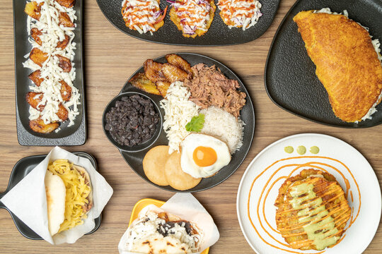Venezuelan food spread with pabellon criollo and various dishes