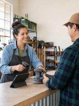 Contactless check in at a tool library scanning a borrowed tool