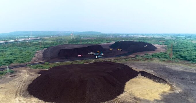 Aerial Drone View of Excavator Loading Coal with Transportation in Gujarat, India
