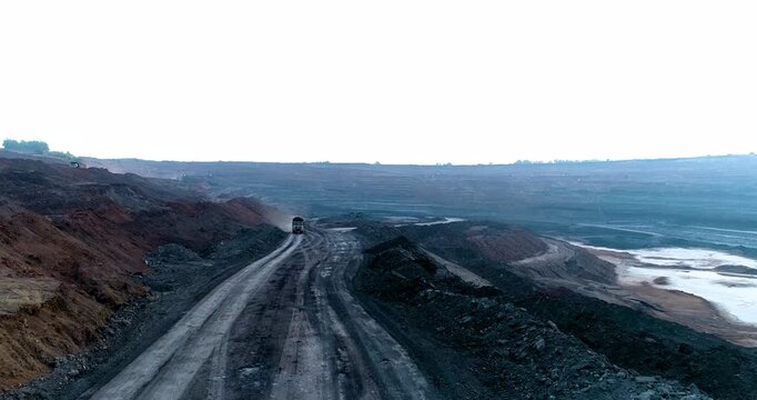 Aerial Drone View of Excavator Loading Coal with Transportation in Gujarat, India