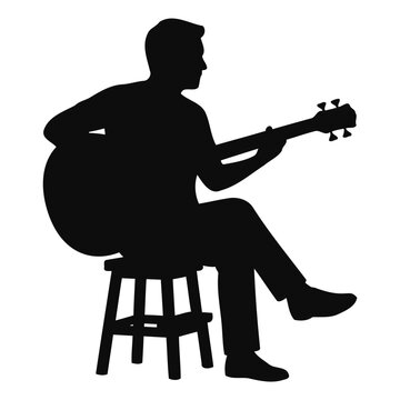 Silhouette of a man sitting on a stool playing an acoustic guitar instrument