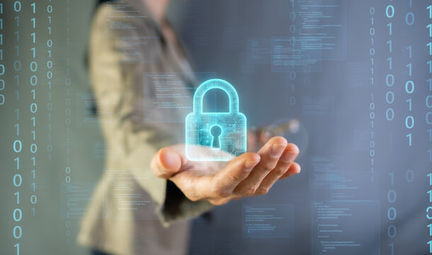 Businesswoman holding digital padlock with binary code for cybersecurity and data protection concept