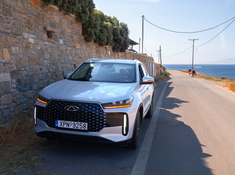 Mykonos, Greece. July 28, 2026. A Chery Tiggo is parked near the sea on the island of Mykonos, Greece.