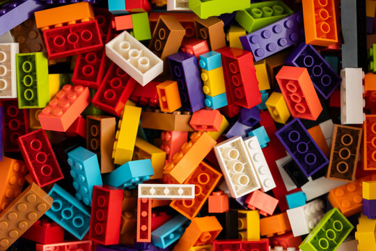 Colorful mix of plastic Lego building blocks and bricks background