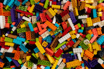Fototapeta premium Colorful mix of plastic Lego building blocks and bricks background