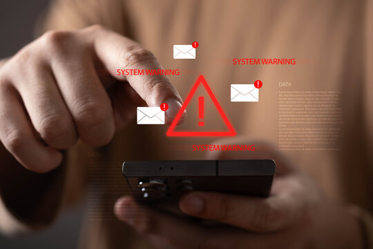 Cybersecurity alert and system warning concept with a user receiving suspicious email notifications on a smartphone. Phishing attack, data breach, online security, cyber threat and risk management.