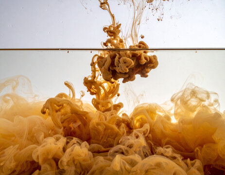 Miso paste being swirled into warm clear water creating artistic clouds of probiotic fermentation texture.