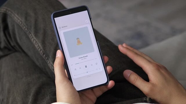 User engaging with a guided Ocean Breath session for mental clarity. Essential visual for stories on corporate wellness programs, burnout prevention, and employee mental health.