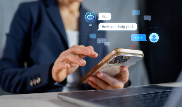 Businesswoman using smartphone with AI chatbot assistant, customer service online support concept