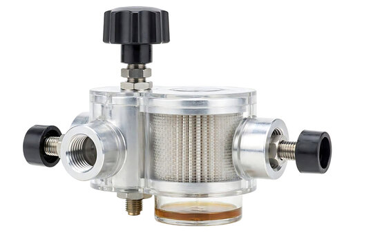 Industrial fluid filter assembly with a transparent bowl, a metallic housing, and black adjustment knobs, isolated on a white background