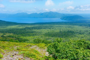 Obraz premium Panoramic view of Lake Shikotsu from the Mount Tarumae hiking trail, Hokkaido, Japan