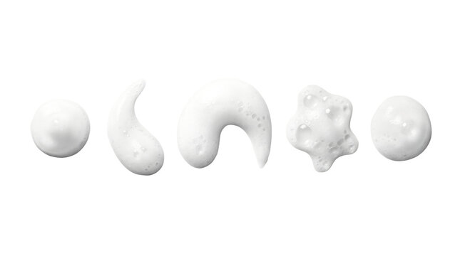 Minimal white cosmetic cream texture swatches on clean background, skincare product smear samples, beauty flat lay
