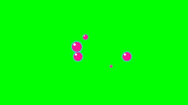 Floating pink liquid soap bubbles rising against a vibrant green background