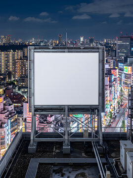 Square Billboard Mockup Structure on High Rise Rooftop with Night City Background