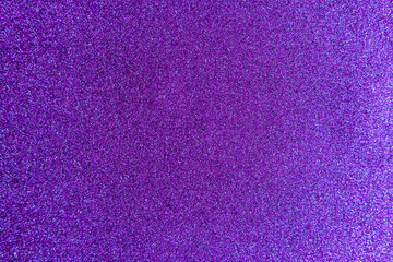 Abstract purple glitter texture background. Shiny violet sparkle texture surface for New Year, party and all celebration.