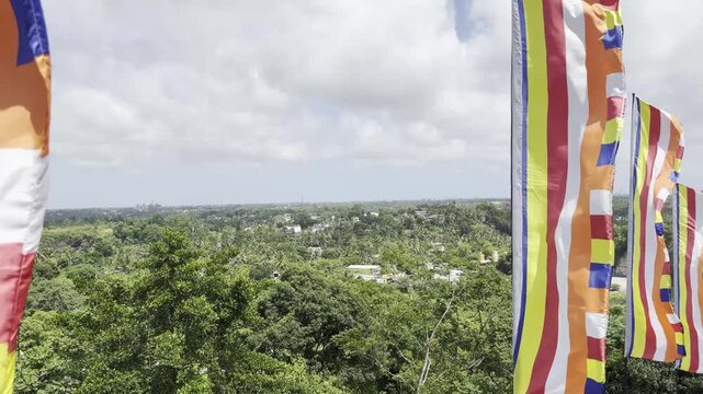 Buddhist Flags Waving at Mountain Peak