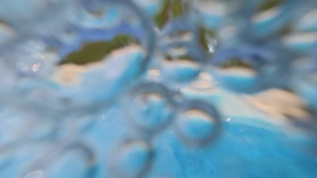 Close-Up of Bubbling Water from Swimming Pool Circulation System