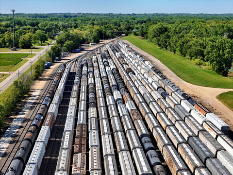 Aerial View of Rail Yard with assorted Train Cars