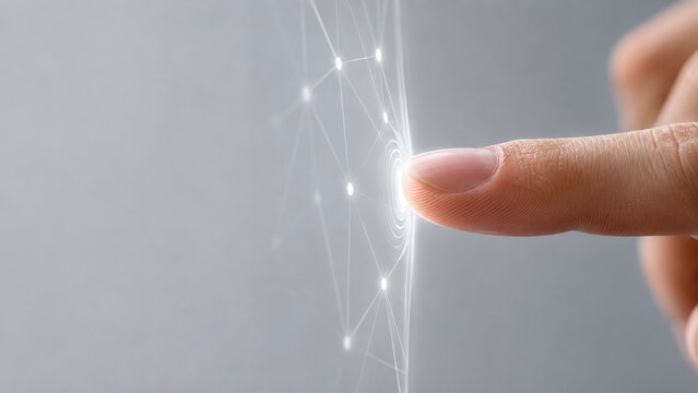 Human Finger Activating a Glowing Digital Network Interface with Connected Data Nodes, Futuristic Touchscreen Technology and Copy Space