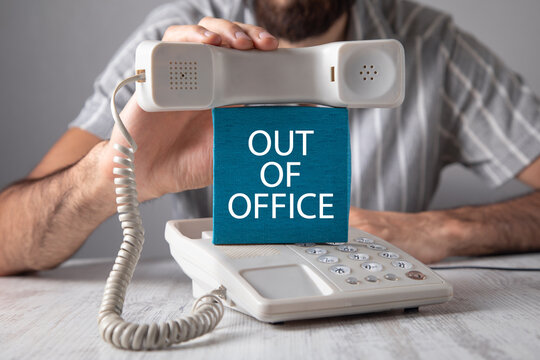 Man showing Out Of Office message.