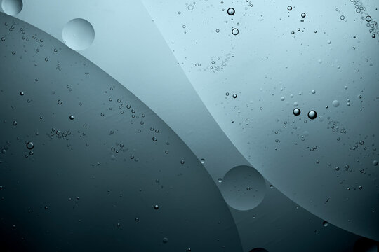Abstract water background with oil drops and bubbles