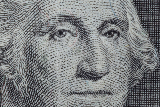 portrait of George Washington on one US dollar banknote