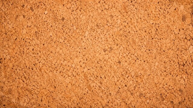 Warm orange recycled cork composite texture background
