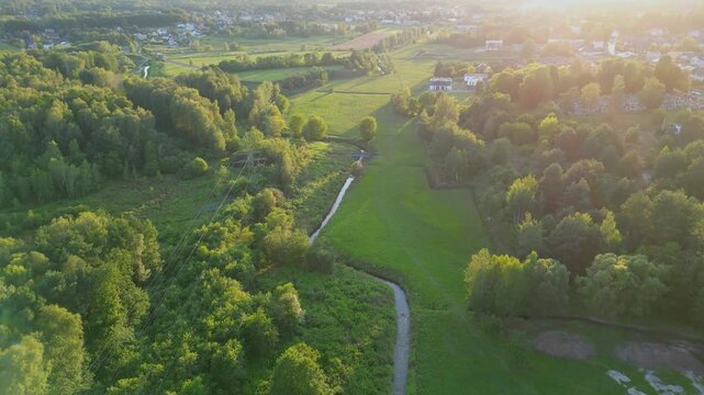 Cinematic aerial pan across misty forested mountain ridge, Katowice Poland
