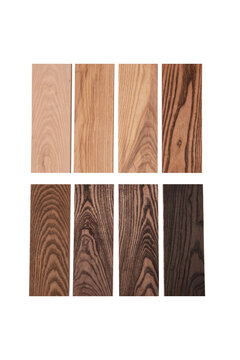 Eight oak wood color swatches and veneer samples isolated on white background.