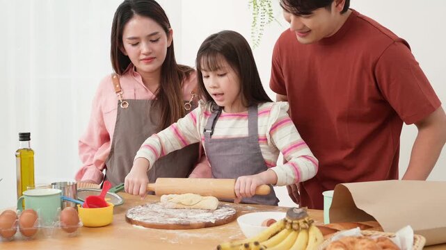 Family Enjoys Baking Together in the Kitchen While Making Cookies