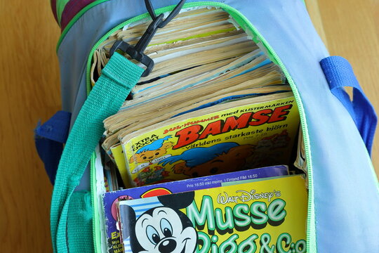 A pile of comic books. Mickey Mouse in front. Swedish text. From the 1980 and 1990s.