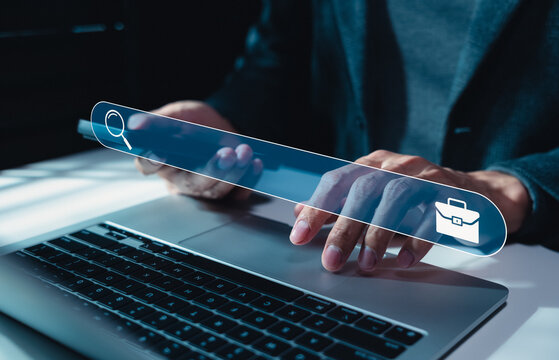 Job search and career opportunity concept. Businessman using laptop and search engine bar, representing online recruitment, vacancy discovery, employment matching, hiring workflow, talent acquisition