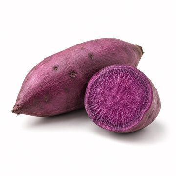 Fresh purple sweet potatoes, whole and sliced, displaying violet flesh