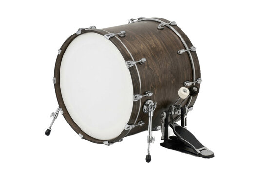 Dark wood bass drum isolated on black background.