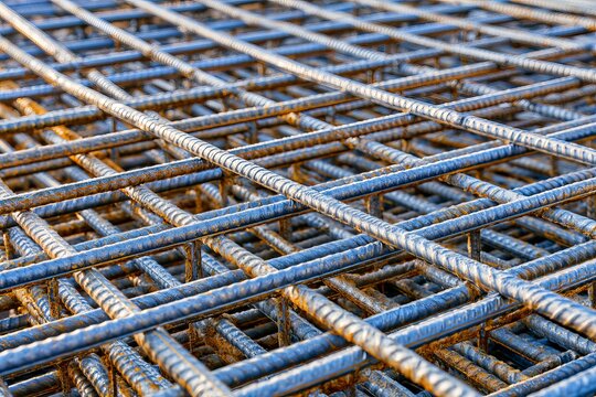 Reinforced steel bars piled together on a construction site ready for use