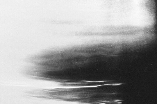 light leak overlay effect with scratch dust and blur light leaks,retro noisy film texture light leak flare on black background,abstract black and white background with red bokeh,grunge film strip