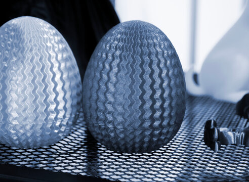 Art models printed on 3D printer. Different objects created on 3D printer from molten plastic. 3D printed different objects. Modern new modern additive progressive technologies. 3D printing technology