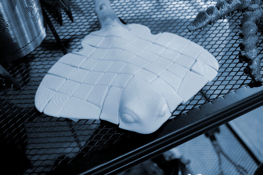 Art models printed on 3D printer. Different objects created on 3D printer from molten plastic. 3D printed different objects. Modern new modern additive progressive technologies. 3D printing technology