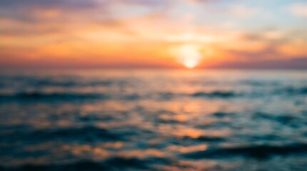 Obraz premium A beautiful golden sunset over the calm ocean waves creating a peaceful and serene atmosphere during the late evening summer time