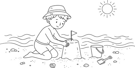 Cute little boy building sandcastle on the beach with bucket and shovel © Mahsina
