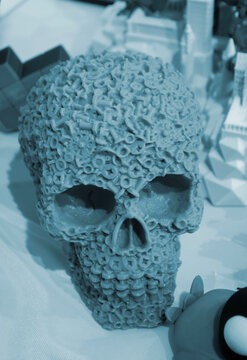 Art models printed on 3D printer. Different objects created on 3D printer from molten plastic. 3D printed different objects. Modern new modern additive progressive technologies. 3D printing technology