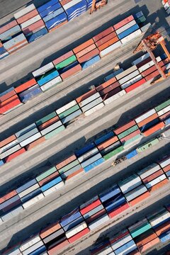 Aerial view of colorful shipping containers stacked in neat rows at the Harem port terminal in Uskudar, Istanbul, Turkey.