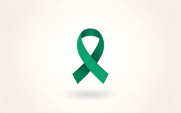 Green awareness ribbon isolated on a light background for medical support and health charity campaigns