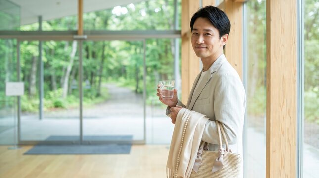 Man Holding Glass of Water, Celebrating World Lungs Day