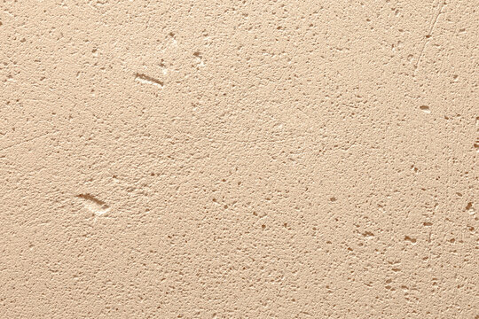 Warm Beige Sandstone Porous Surface and Travertine Stone Texture Background