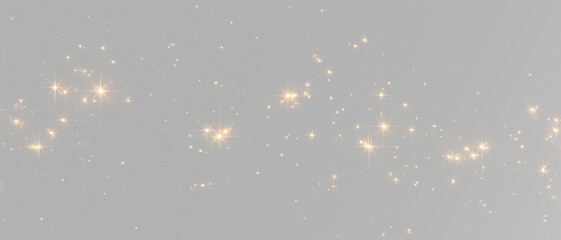 Shimmering golden star lights with sparkling glitter particles, magic dust and bright festive flares © Hachapuri