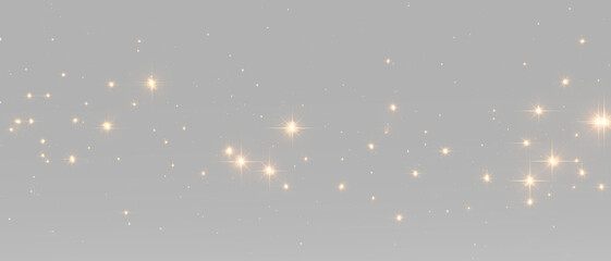Shimmering golden star lights with sparkling glitter particles, magic dust and bright festive flares © Hachapuri