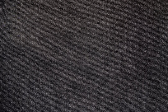 Faded Black Denim Fabric Texture Background